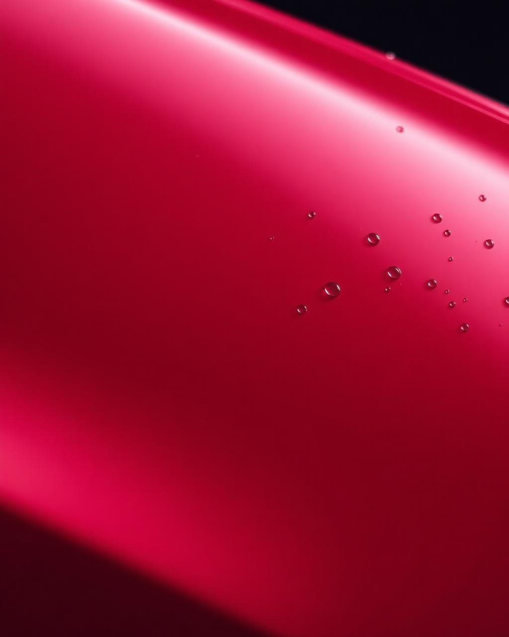 Close-up of water beading on a ceramic coated hood